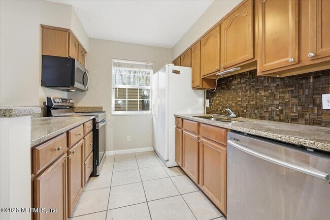 Foto del edificio - 4810 Windrush Ln