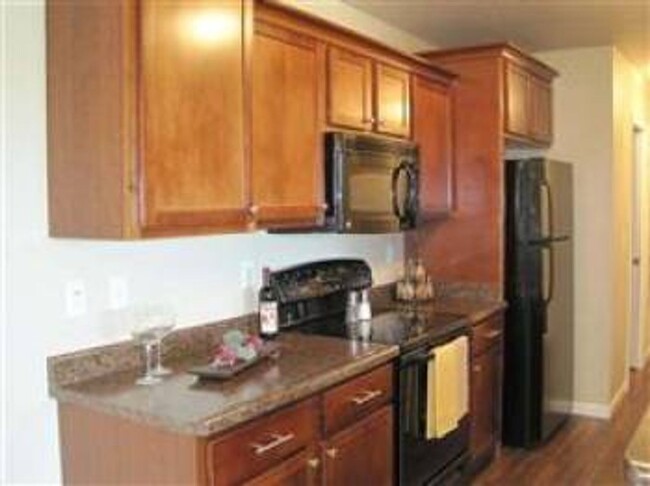 Building Photo - Wonderful 2 Bedroom Townhome in a Great No...