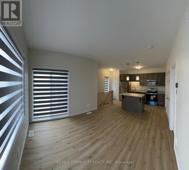 Photo du bâtiment - 64a Riverstone Wy