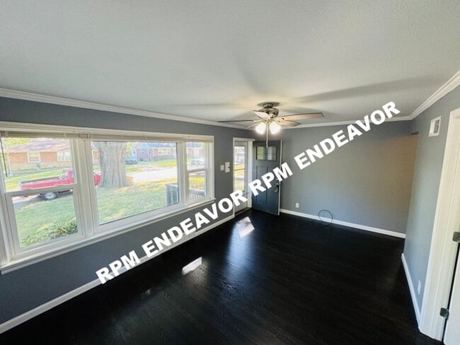 Building Photo - "Charming 4-Bedroom Haven with Sunroom, Ha...