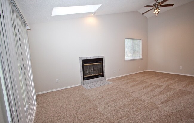 Spacious living room with vaulted ceiling - 214 142nd St E