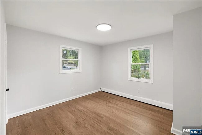 Building Photo - Discover this beautifully updated Cape Cod...
