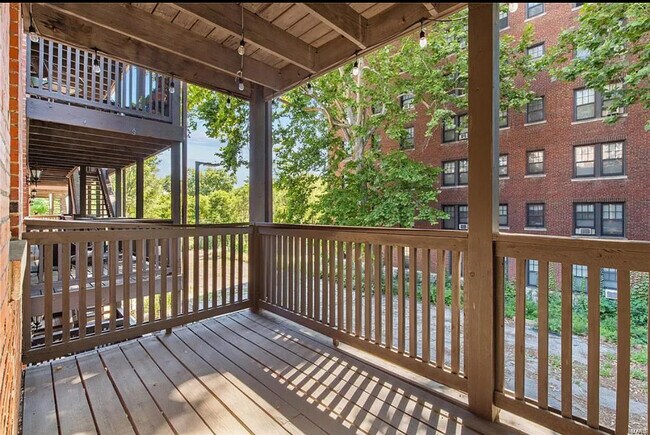 View of private deck with reserved parking spot - 5350 Pershing Ave