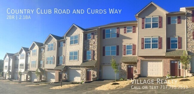 Building Photo - Spacious 2 bed, 2.5 bath Townhome with Gar...