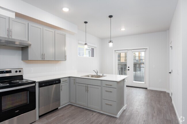 3HAB, 3,5BA - 1,325-1,347SF (Condominio esquinero) - Westman Mills Townhome & Apartments