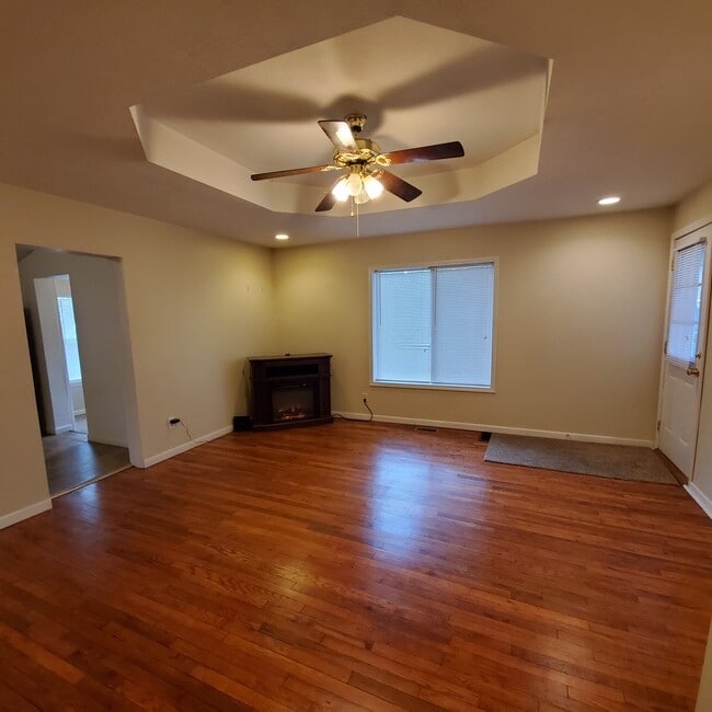 Custom trayed ceiling & cozy fireplace - 328 Milton Ave