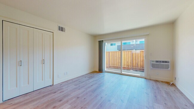 Living Room & Patio Entrance - Sonoma Park Apartments