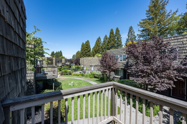 2BR, 2.5BA - 825SF - Balcony View - Cedarwood Apartments