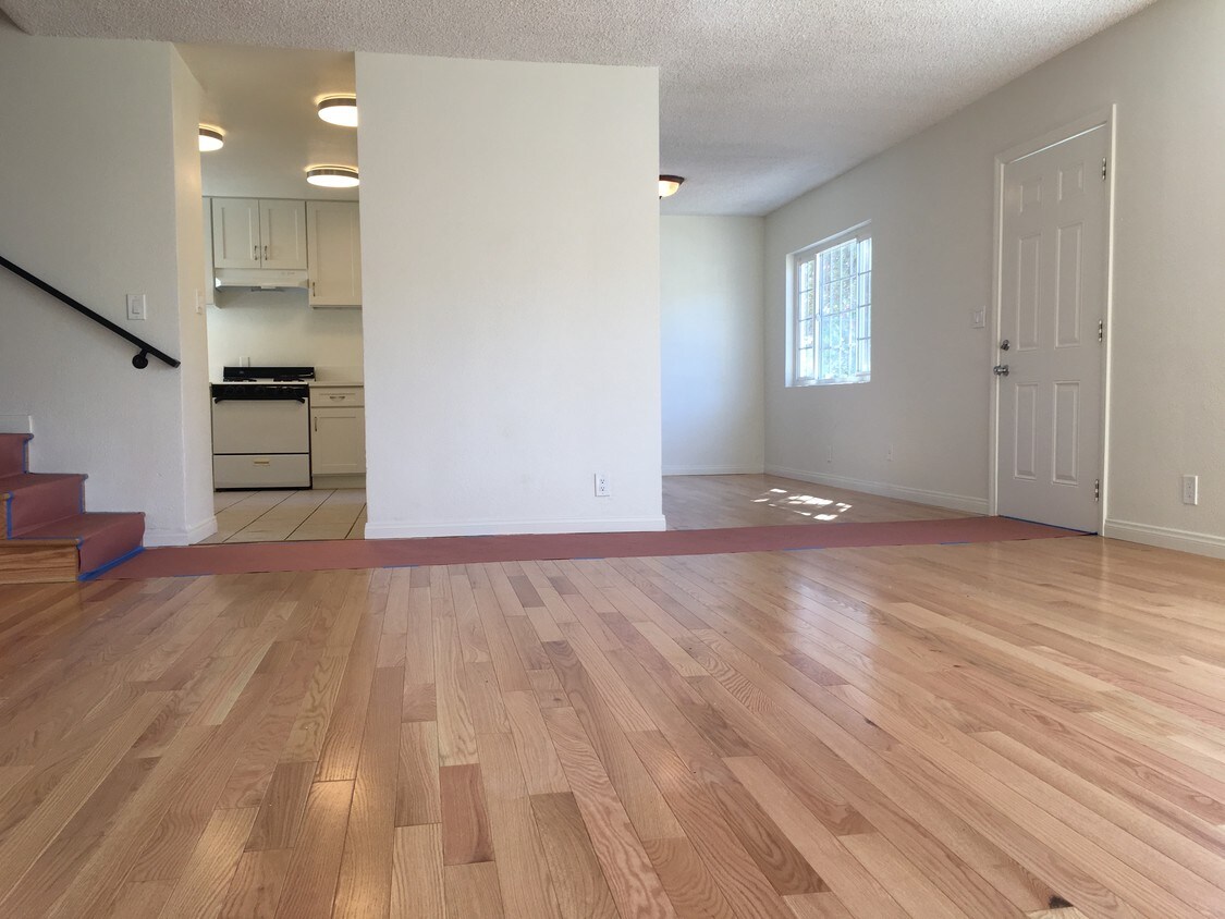 Living room, looking into kitchen and dining - 1738 Roosevelt Ave