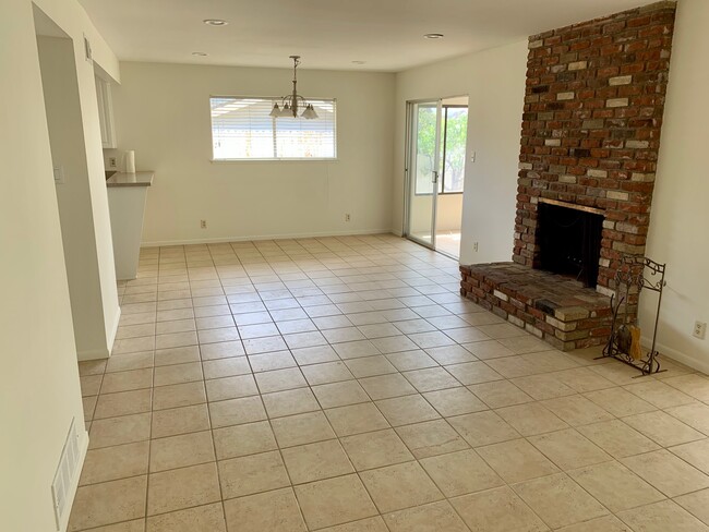 living room with fireplace - 25322 Yacht Dr
