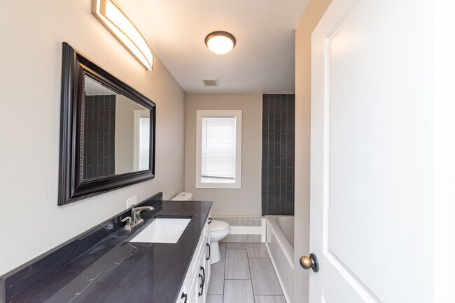 Foto del edificio - 3058 N Kostner Ave