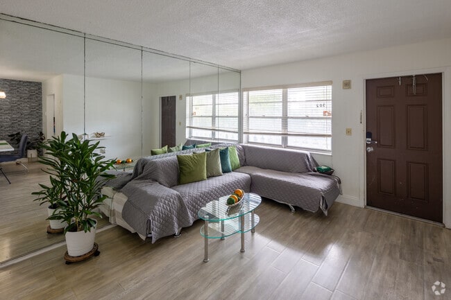 Sala de estar - Sans Souci Tennis Apartments