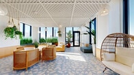 Located at 10-14 LeCount Place in New Rochelle, NY, this thoughtfully designed lounge and amenity space offers a bright, open atmosphere defined by an abundance of natural light and sweeping panoramic views of the New Rochelle skyline. Floor-to-ceiling windows wrap the perimeter, flooding the interior with sunlight and creating a seamless connection to the urban landscape beyond.

The space is anchored by a striking geometric blue-and-white tile floor, which adds a playful yet refined character throughout. Overhead, an intricate white lattice ceiling panel serves as a bold architectural focal point, complementing the pendant lighting suspended at varying heights. Warm wood wainscoting and accent details provide an inviting contrast to the bright white walls.

The layout features multiple distinct seating arrangements, including rattan egg chairs, a modular gray sofa flanked by tall ornamental grasses, and casual groupings of wicker armchairs — all arranged to encourage conversation and relaxation. Lush tropical and ornamental plants are strategically placed throughout, enhancing the biophilic ambiance of the space.

A set of sleek black-framed glass doors provides access to an adjacent area, while an entry corridor connects to an outdoor terrace. The overall design balances modern sophistication with natural warmth, making this an inviting communal destination.