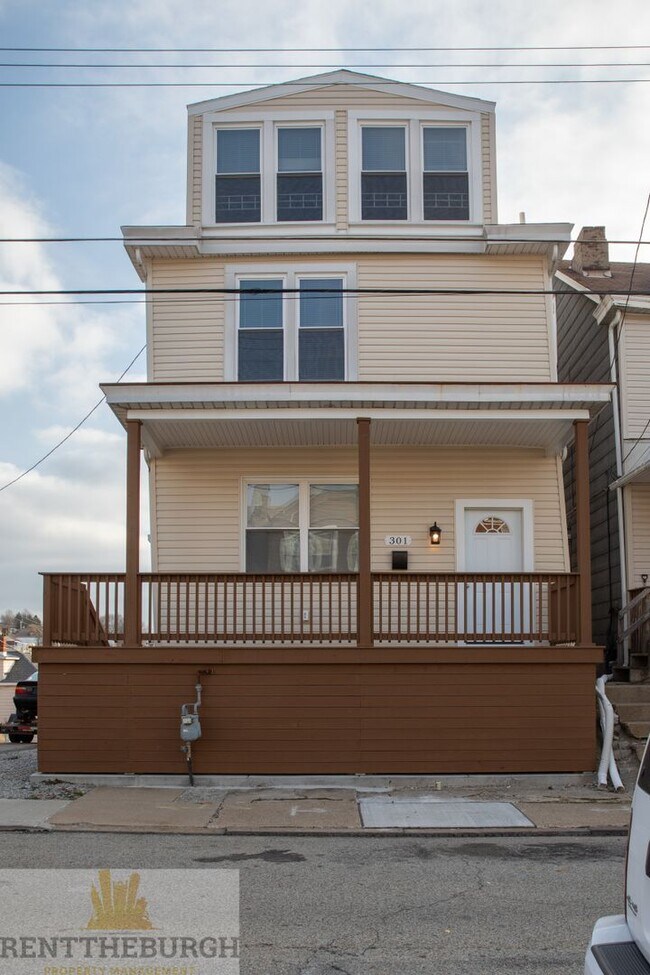 Foto del edificio - Updated 4BR House with 2 full baths and yard!