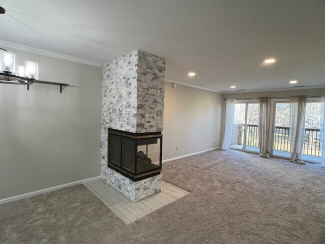 remoldeled living room with fireplace - 1075 Bedford Dr