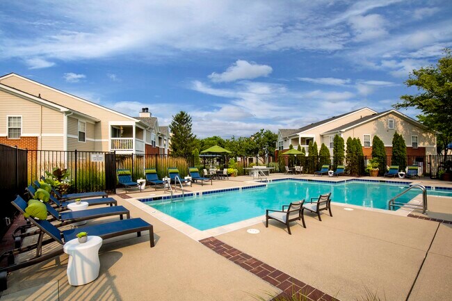 Resort-style pool and expansive sundeck - The Lakes Apartments