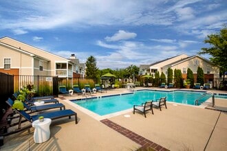Resort-style pool and expansive sundeck - The Lakes Apartments