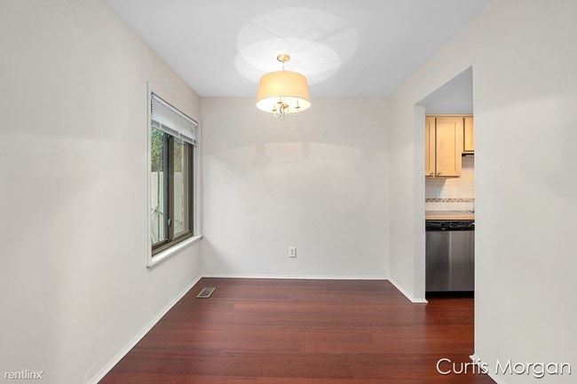 Building Photo - 3 br, 2.5 bath Condo - 6215 Acropolis Dr SE