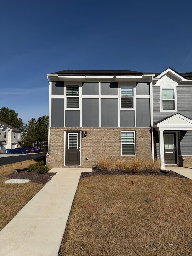 Building Photo - Modern Two-Story Townhome with Open Floor Plan and Garage