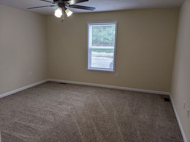 Building Photo - Cozy lower-level two-bedroom apartment!
