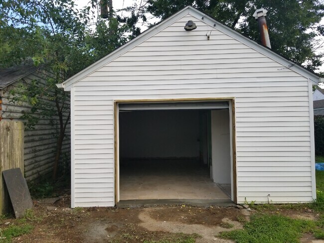 Garage in in back fully fenced in yard - 159 Burrage Road