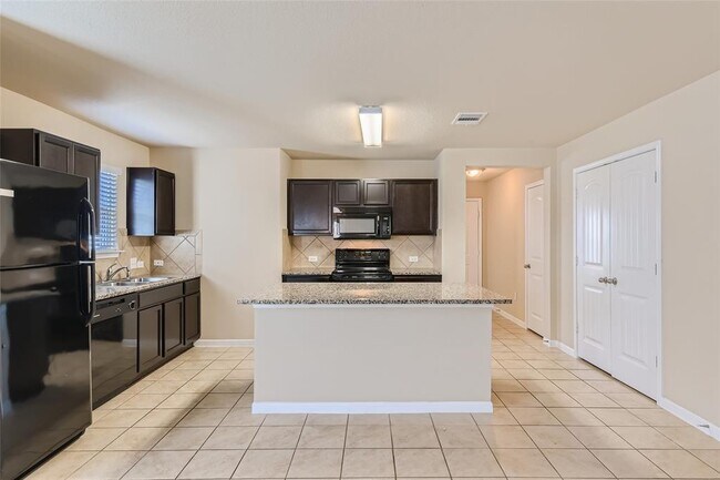 Building Photo - 5704 Montrelia Dr