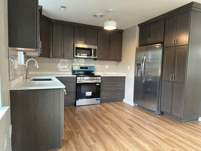 All new cabinets, counters and appliances - 804 Matheson Ave