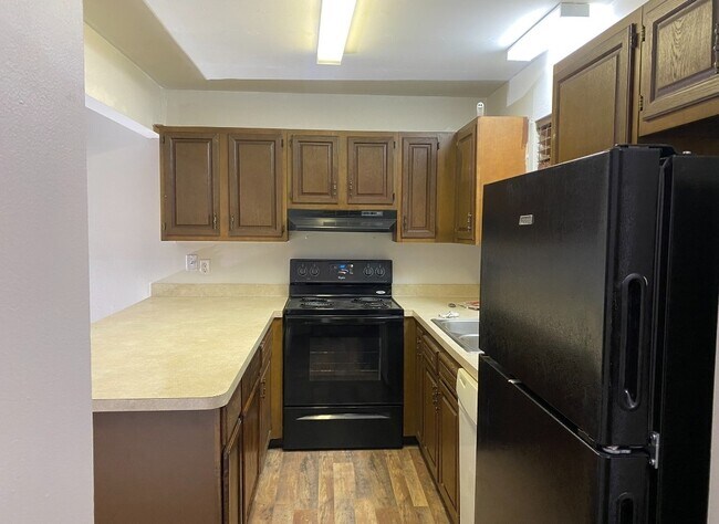 Kitchen with dishwasher and disposal - 622 Portage Lakes Dr