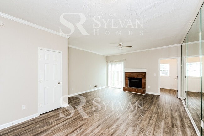 Building Photo - Charming 2BR Brick Haven Awaits You