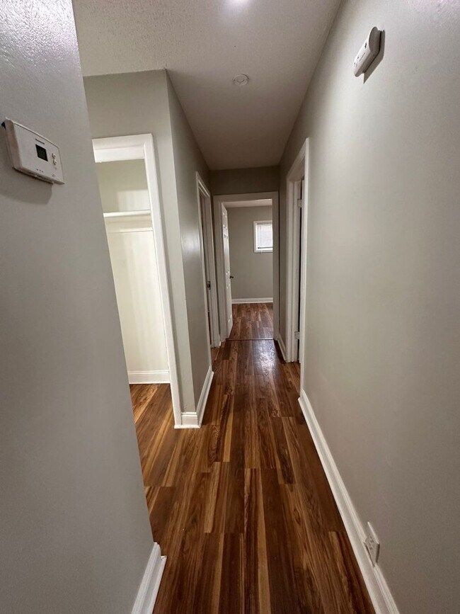 Building Photo - 4 bedrooms 1 Full bathroom. The house is very spacious living room, dining room and full kitchen ...