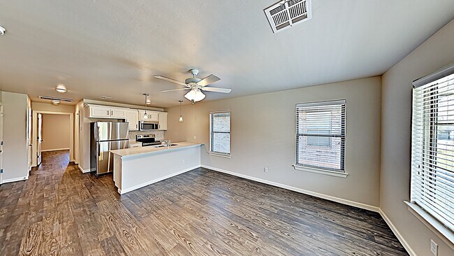 Building Photo - 2 Bedroom 2 Bathroom 1 Car Garage Duplex with upgrades located off Broadway Extension, a short di...
