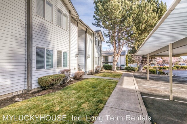 Building Photo - 1850 NE Lotus Dr