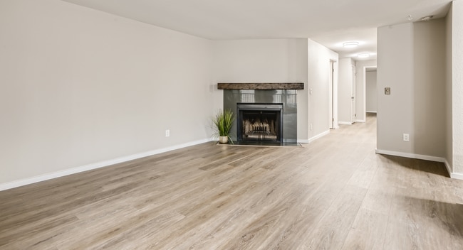Living room with wood burning fireplace - 19851 25th Ave NE