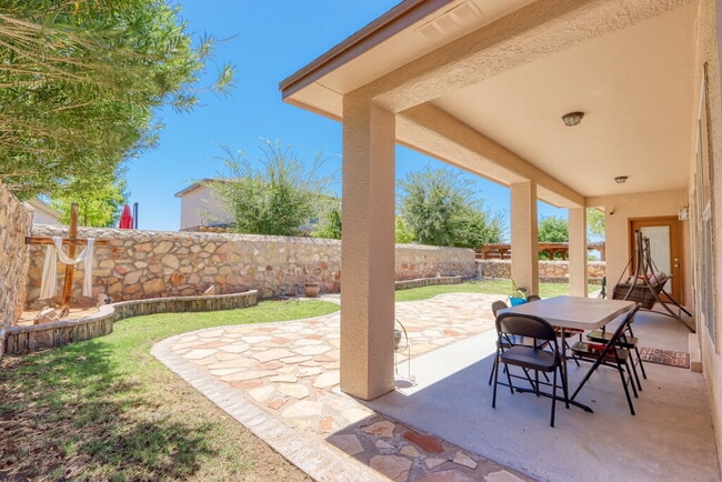 Building Photo - "Spacious 4-Bed Oasis with Granite Touches...