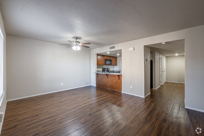 2BR, 1.5BA - 1,100SF - Living Room - Pavilion Place Apartments, LLC