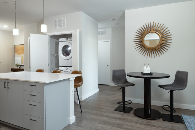 Kitchen and dining area with hard surface flooring - Avalon Brighton