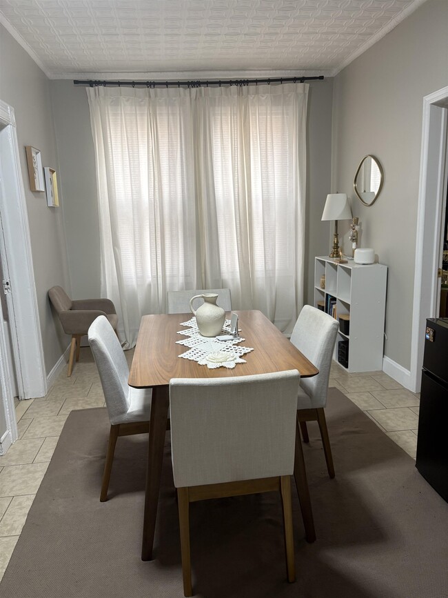 Building Photo - 121-123-123 W 25th St