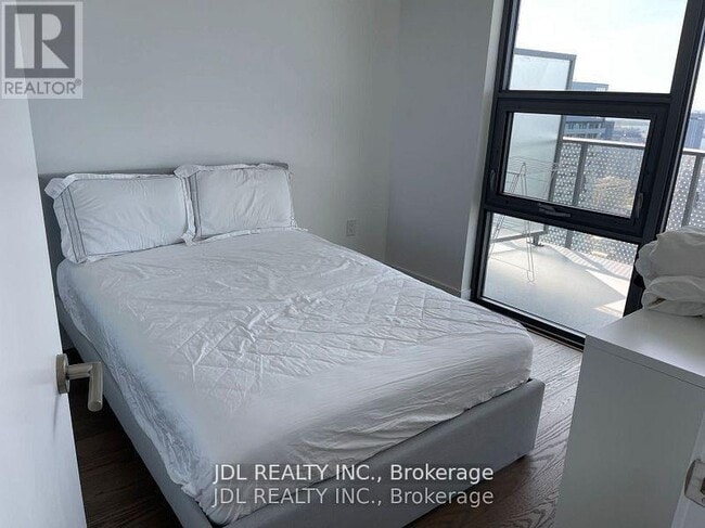 Building Photo - 11 Wellesley St W