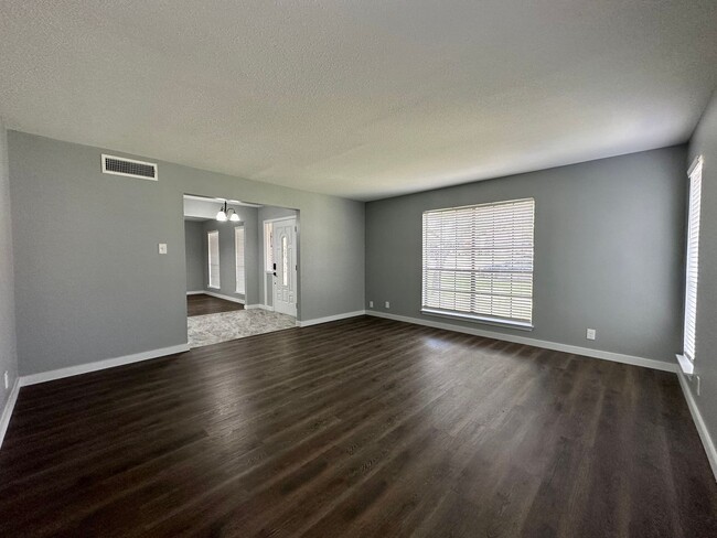 Building Photo - PRICE IMPROVEMENT! Stylish home with solar...