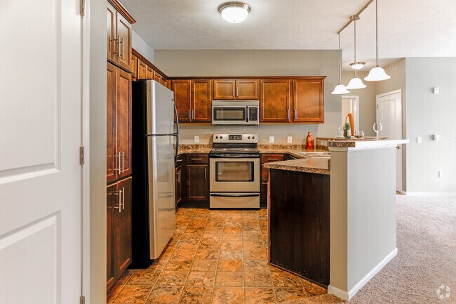 2 HAB, 2 BA: 1,140 ft² - The Ponds at Heritage Place