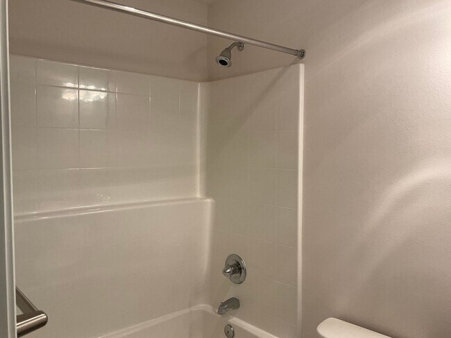 Building Photo - Riverfront Townhome with Tandem Garage & Fenced Yard