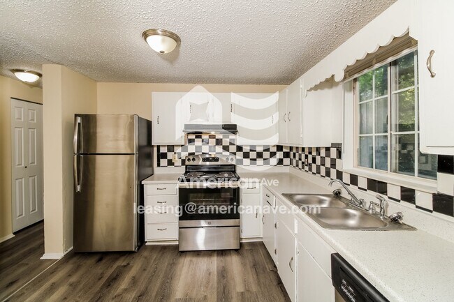 Foto del edificio - 3004 Windwood Pl