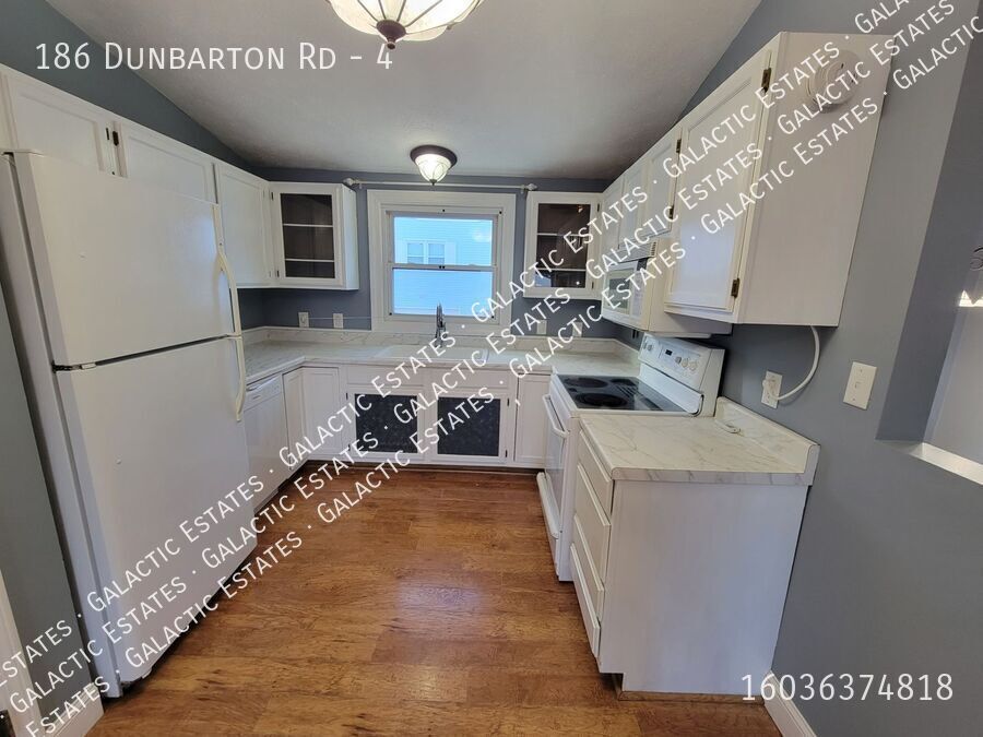 Foto principal - 2 bed 1 bath townhouse with under garage p...