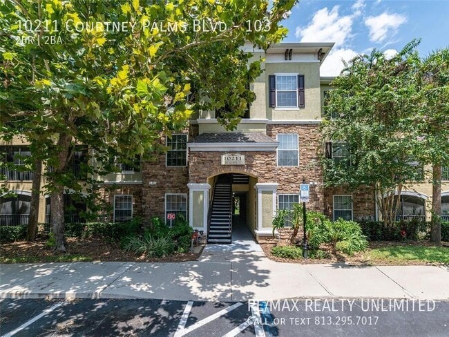 Photo - 10211 Courtney Palms Blvd Apartment