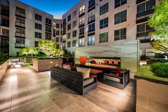 Expansive social courtyard with double-sided fireplace - Hanover Walnut Creek