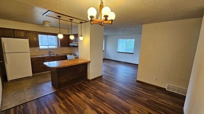 Building Photo - 3 bedroom Ranch Style Duplex backing to open space.