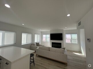 Living Room with gas / wood burning fireplace - 221 36th Pl
