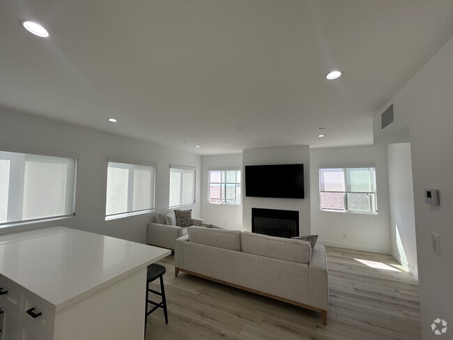 Living Room with gas / wood burning fireplace - 221 36th Pl