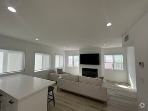 Living Room with gas / wood burning fireplace - 221 36th Pl