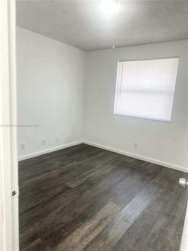 Building Photo - 10875 NW 45th St